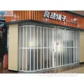 Puerta plegable comercial alta transparente